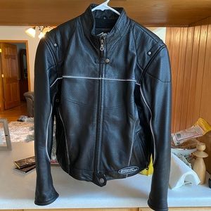 Harley Davidson. Large. Motorcycle coat. Leather. Reasonable offers accepted.